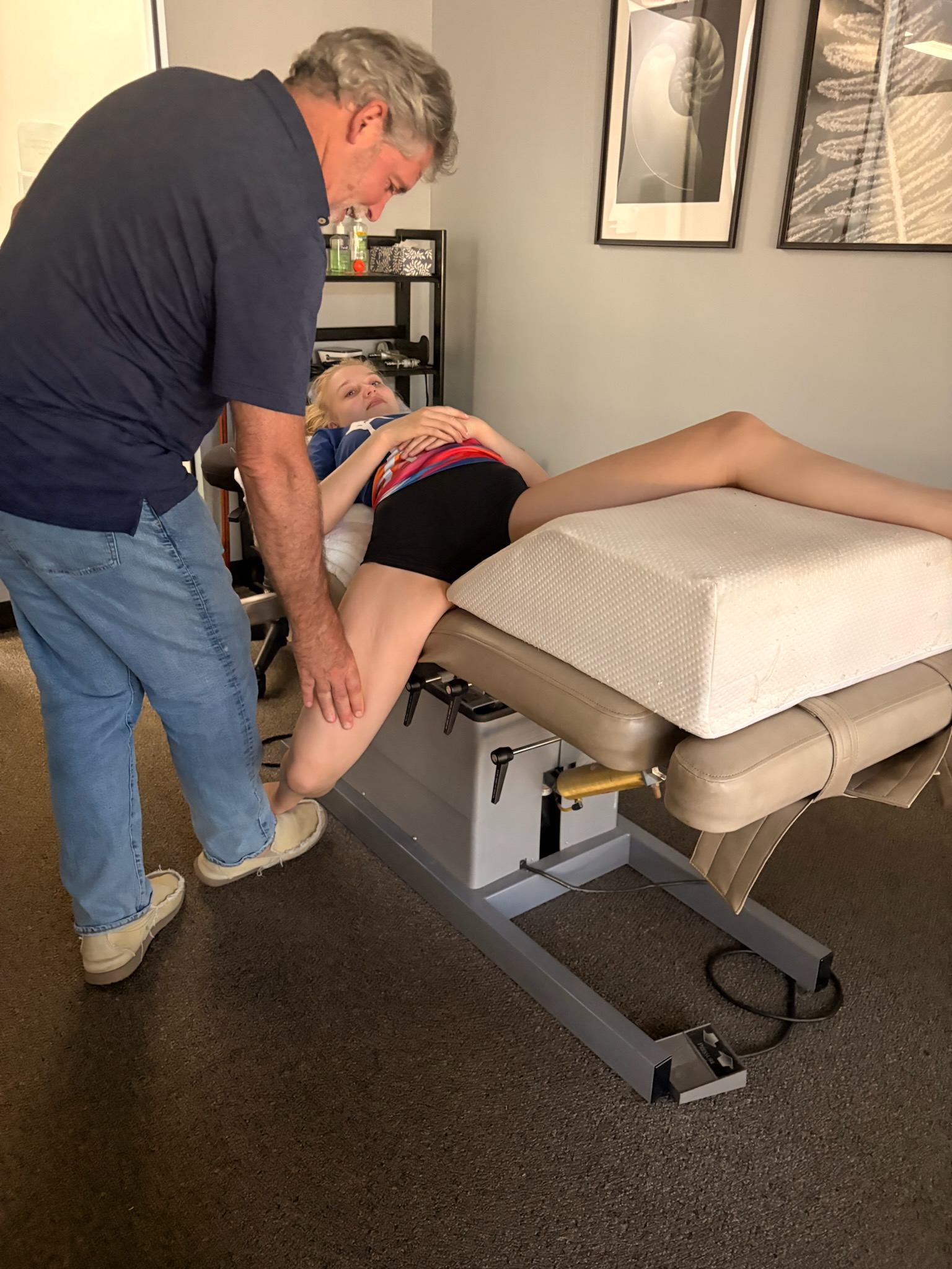 Dr. Jim evaluating an athlete's movement